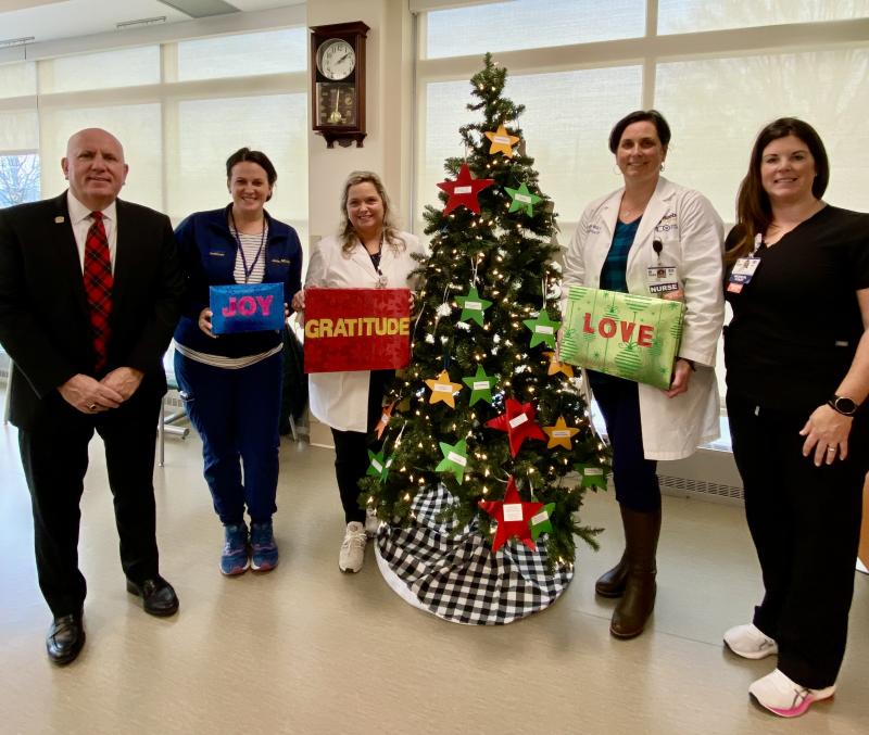 Tom Protack, Beebe Medical Foundation president, is joined by (l-r) RNs Jamie Dickerson, director of Patient Care Services; Loretta Ostroski, vice president of Inpatient Nursing and Emergency Services; Tara Cooper, director of Critical Care Services; and Laura Tolson, NP, Early Nursing Intervention Team nurse manager. SUBMITTED PHOTO